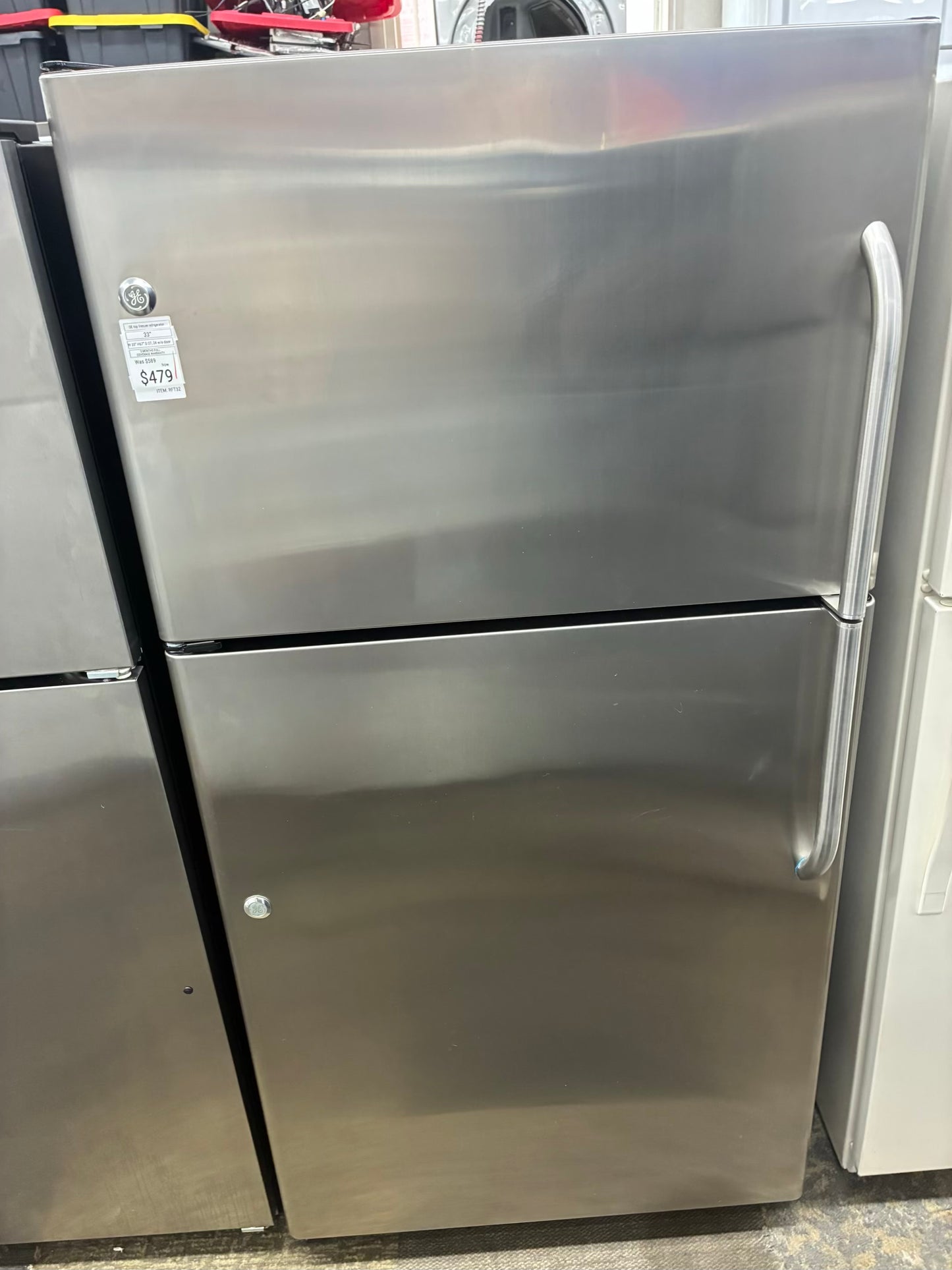 GE top freezer refrigerator stainless steel 33”