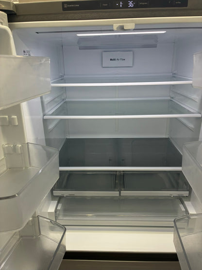LG  French door refrigerator stale stainless steel 33” water dispenser