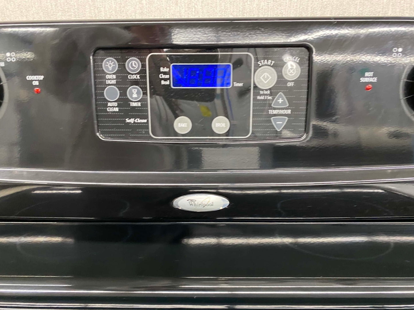 Item: #ER29U  whirlpool electric 220v range 4 burner  black  30 in