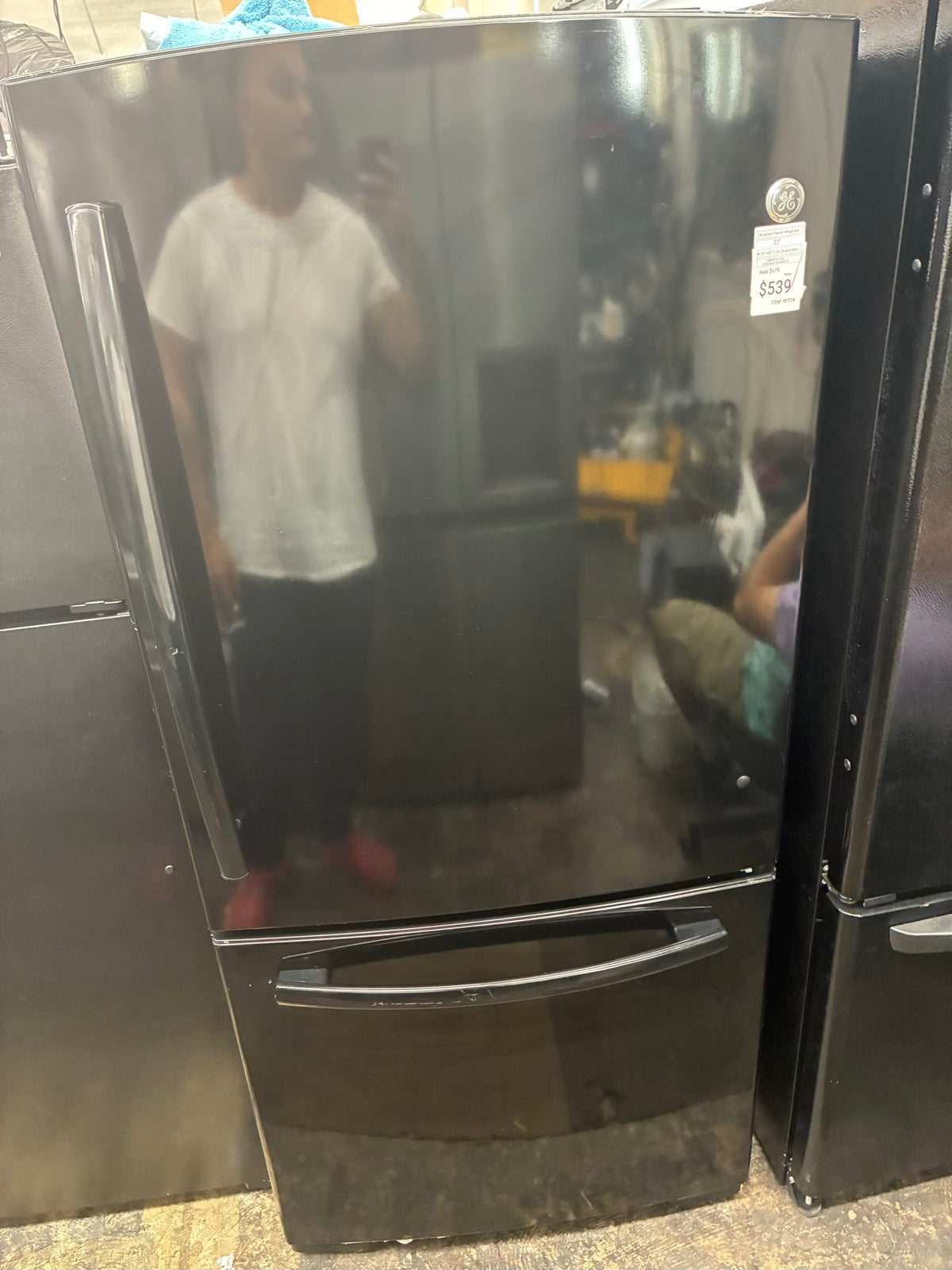 GE bottom freezer refrigerator  33” black