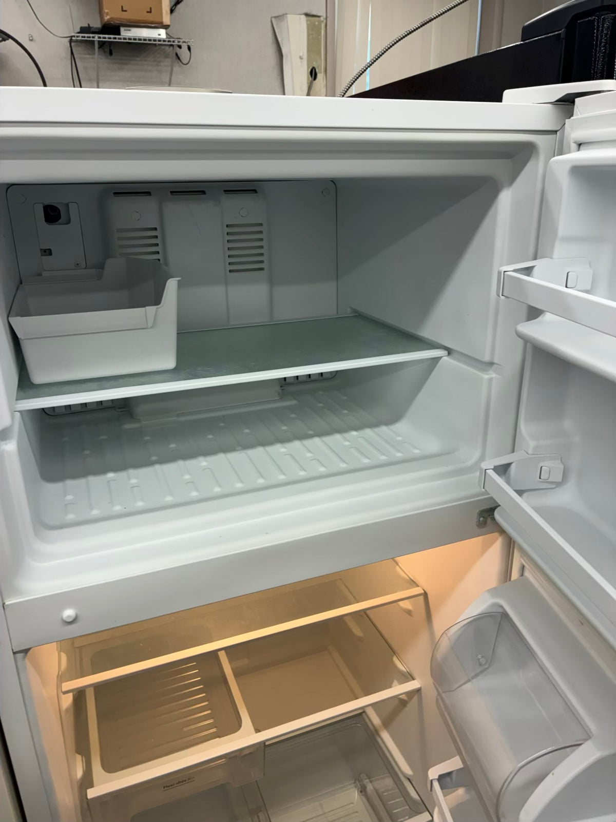 Whirlpool top freezer refrigerator  30”