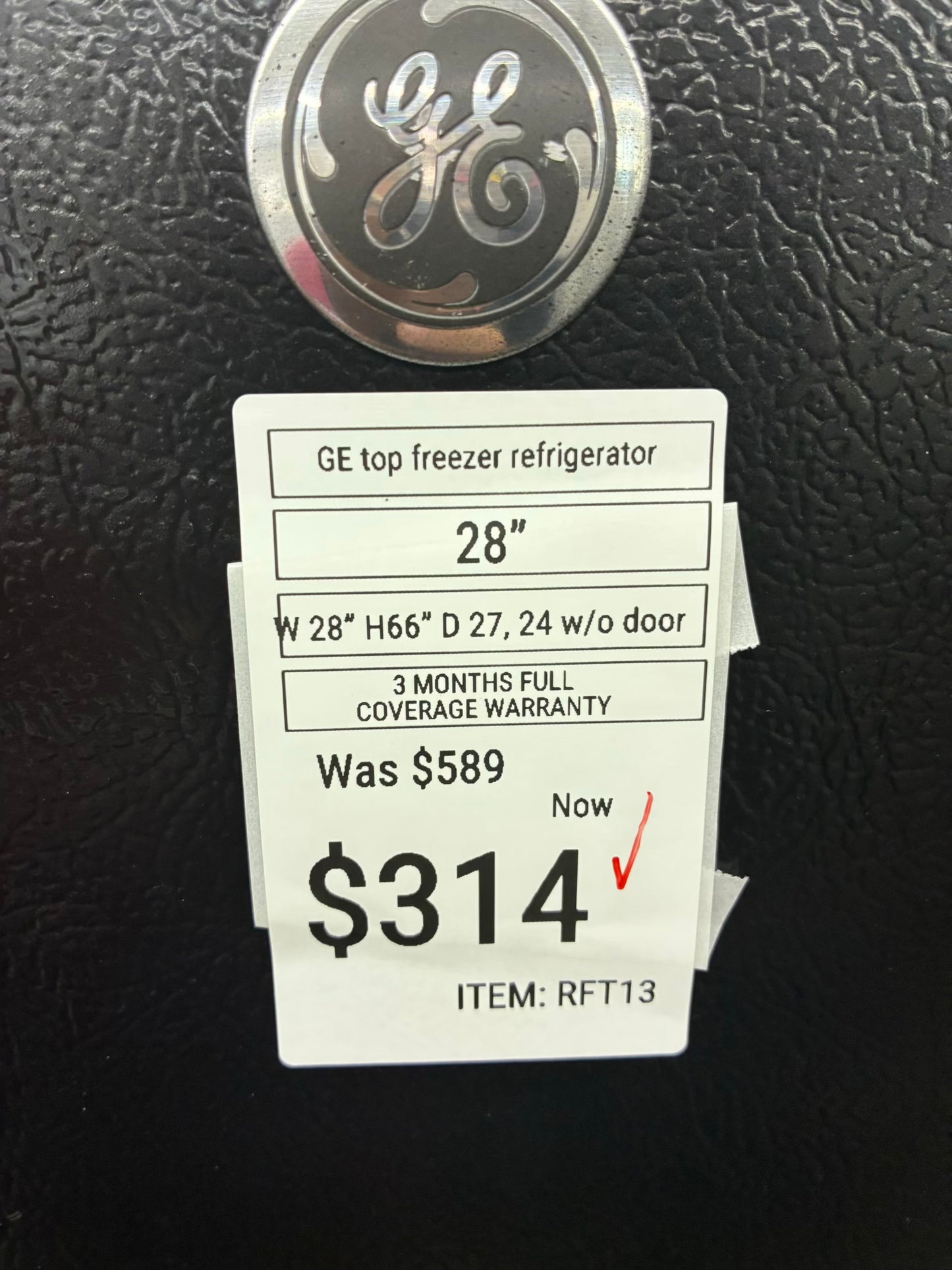 GE top freezer refrigerator black 28”