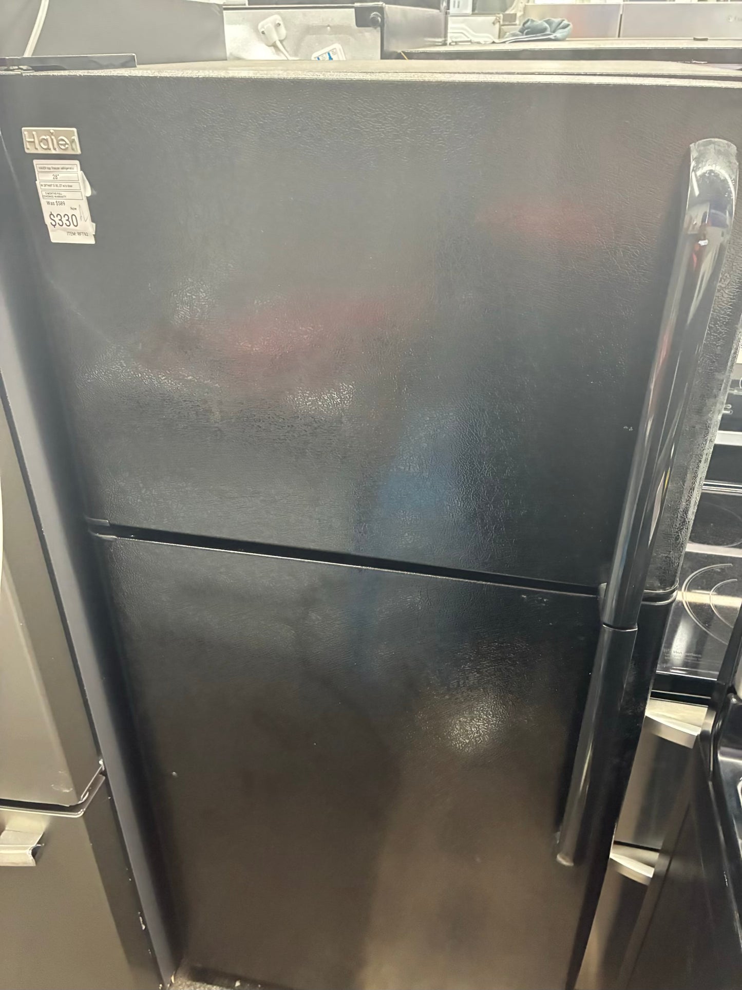 HAIER top freezer refrigerator black 28”