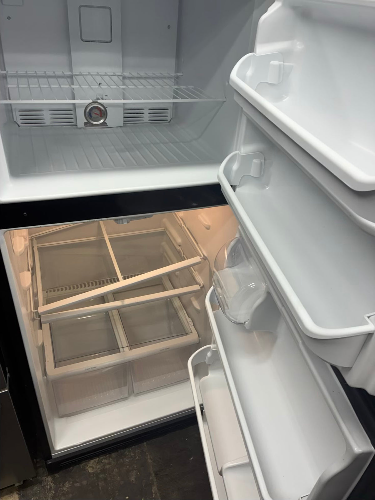 Frigidaire top freezer refrigerator  30” stainless steel