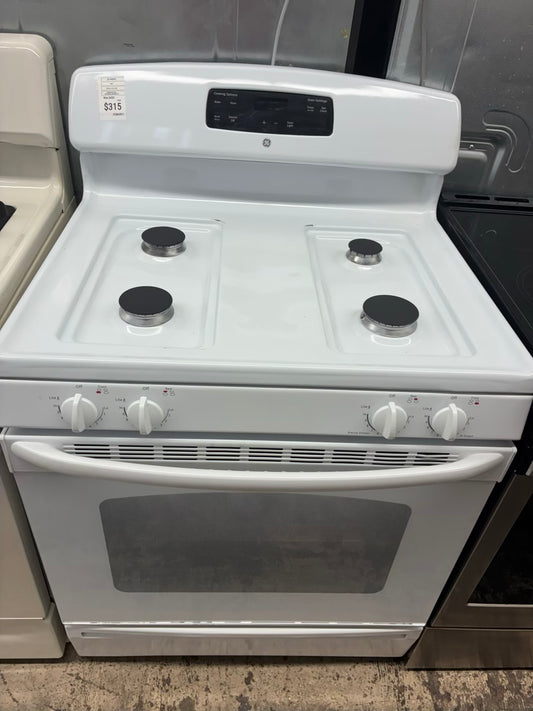 GE gas range , 4 burner white color 30”