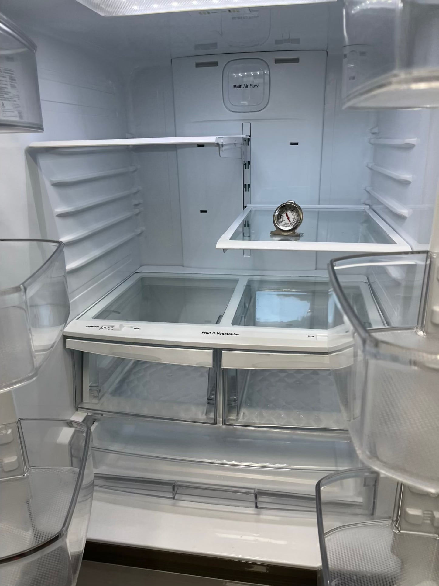 ^ Item #RF38W LG french door refrigerator stainless steel w/ ice  dispenser inside 30” in