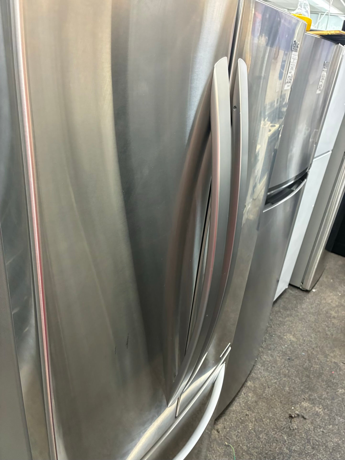 LG French door refrigerator stainless steel 30” ice maker water dispenser show case