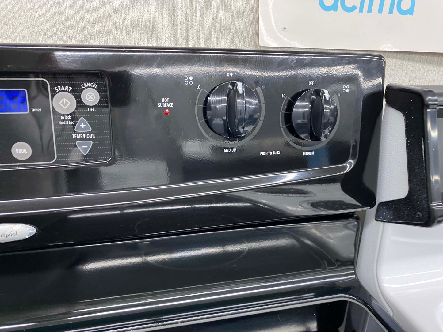 Item: #ER29U  whirlpool electric 220v range 4 burner  black  30 in