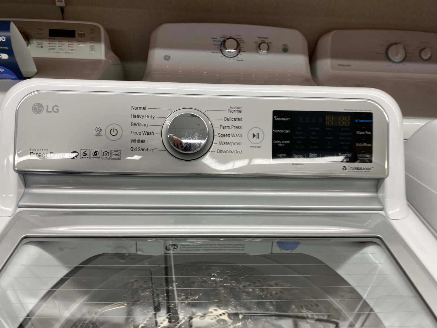 Item: #ED64B LG high efficiency and electric dryer andwqshing machine set stainless steel drum side by side 27”