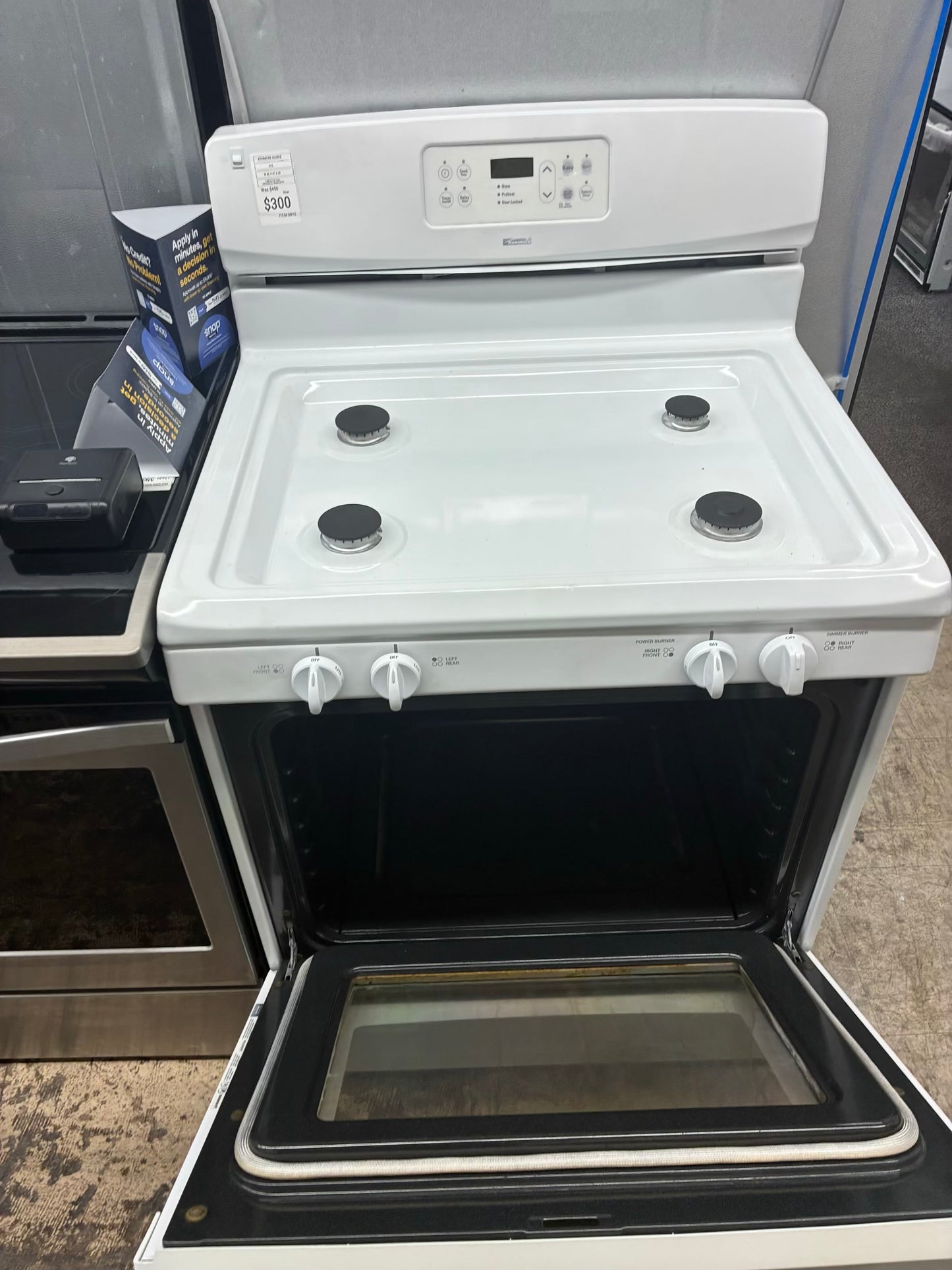 Kenmore gas range , 4 burner cream color 30”