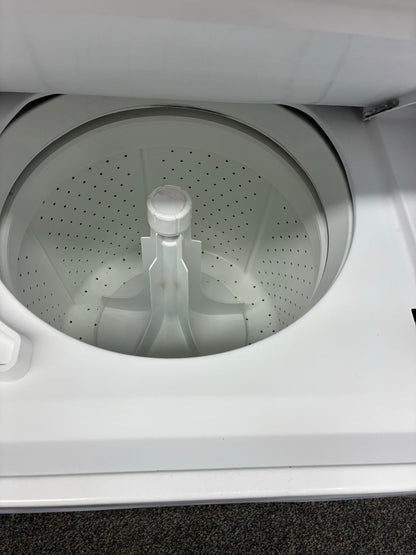 GE laundry center  washer and dryer set gas stackable 27”