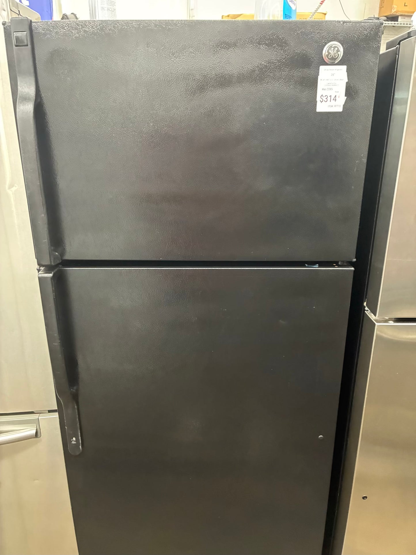 GE top freezer refrigerator black 28”