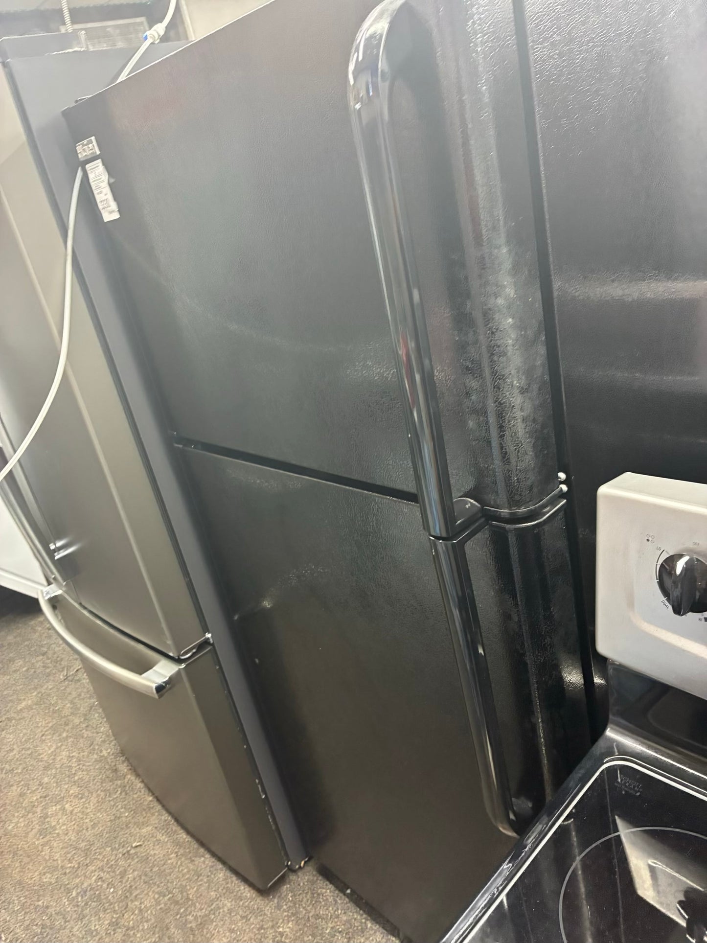 HAIER top freezer refrigerator black 28”