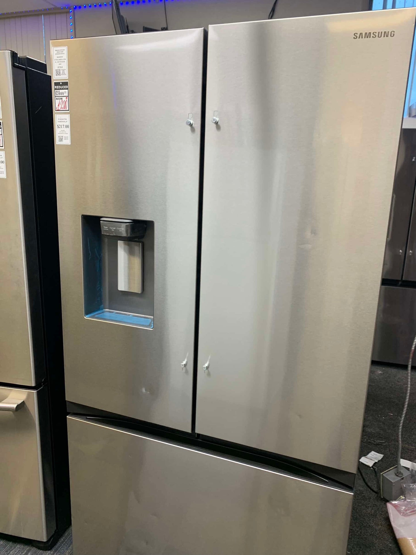 🔥 HOT DEAL ★ Samsung Open Box 31 cu. ft. Mega Capacity 3-Door French Door Refrigerator with Four Types of Ice in Stainless Steel 36 in Depth RF7915