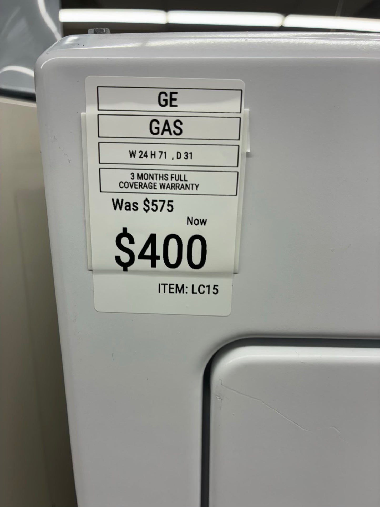 GE laundry center  washer and dryer set gas stackable 27”