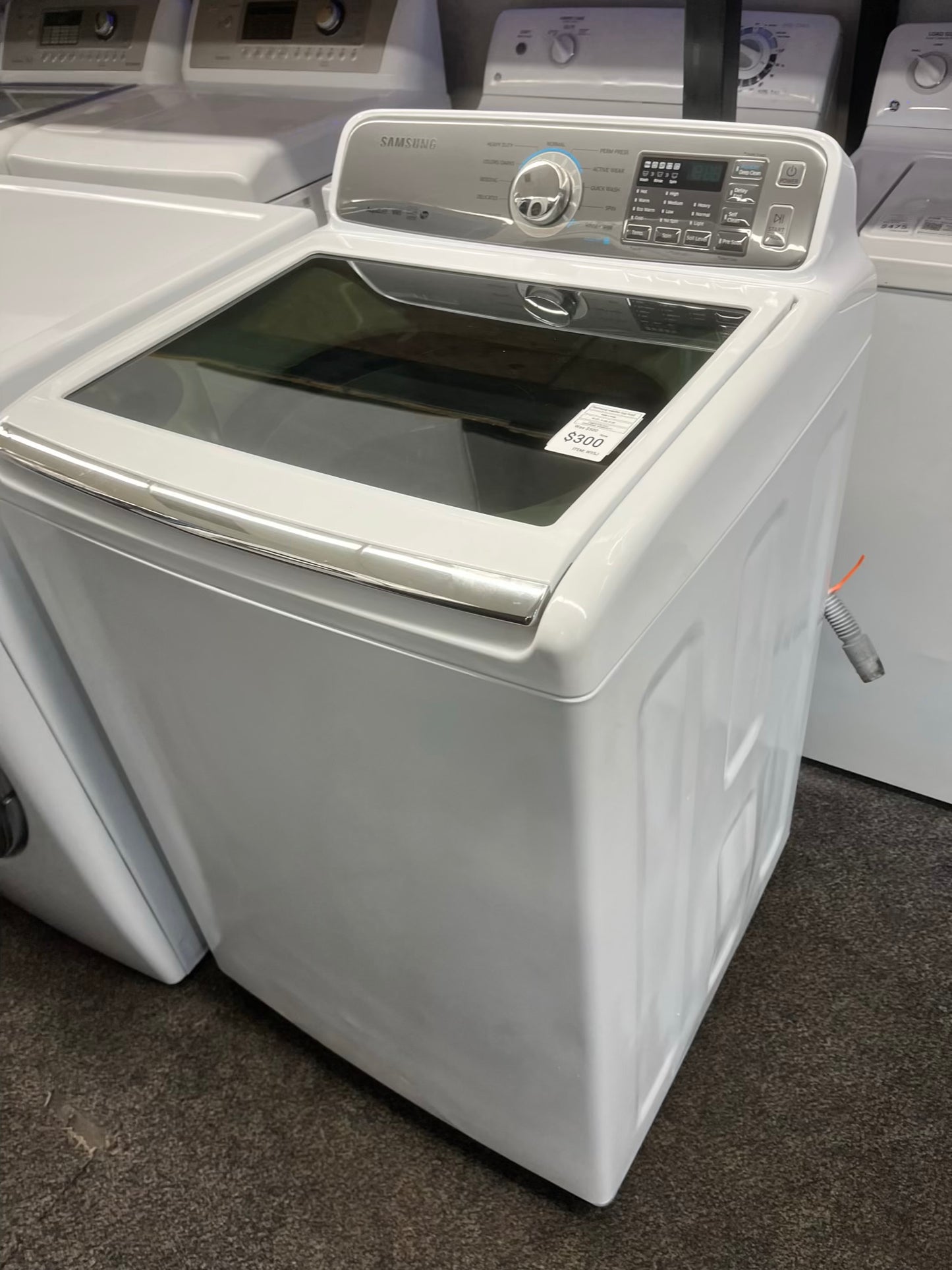 ^ ITEM #W95J Samsung top load washing machine large capacity stainless steel drum , side x side 27