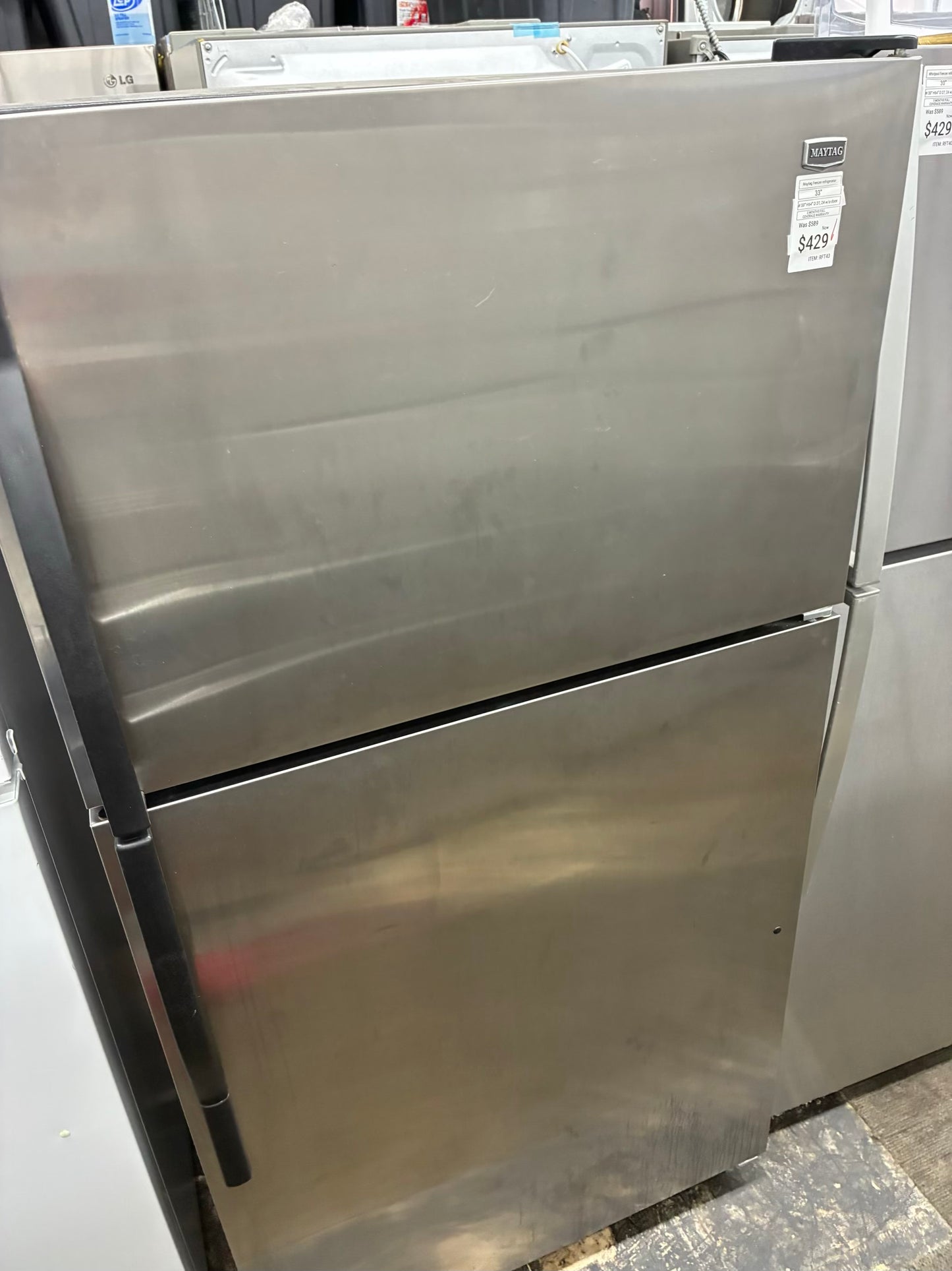 Maytag top freezer refrigerator stainless steel 33”