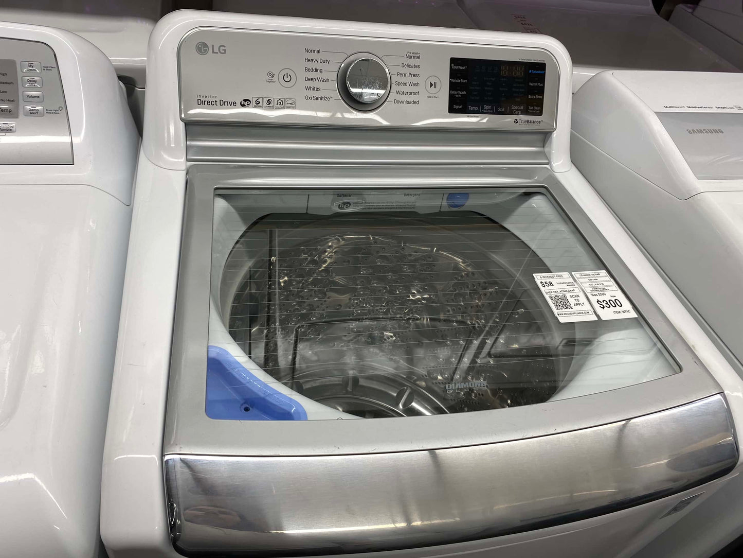 Item: #ED64B LG high efficiency and electric dryer andwqshing machine set stainless steel drum side by side 27”
