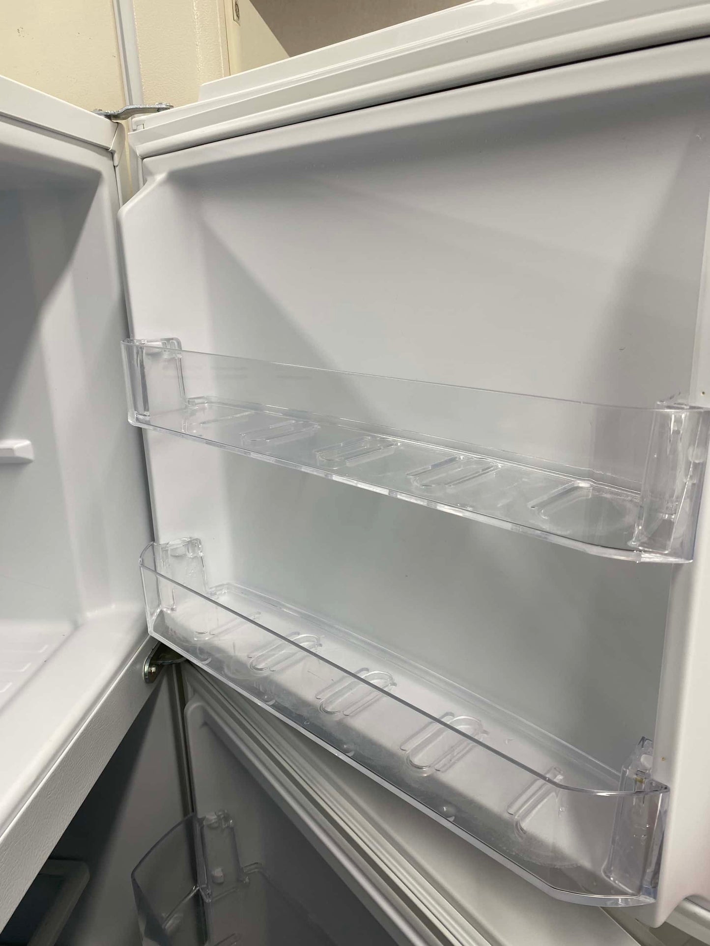 - ITEM: #RF96C Whirlpool top freezer white refrigerator  24 inc
