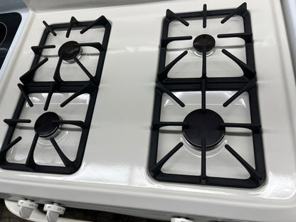^ ITEM #ER85G Kenmore gas range bisque 4 burner 24” in
