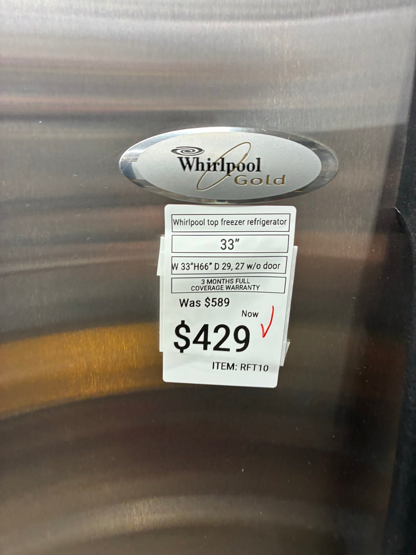 Whirlpool top freezer refrigerator stainless steel 33”