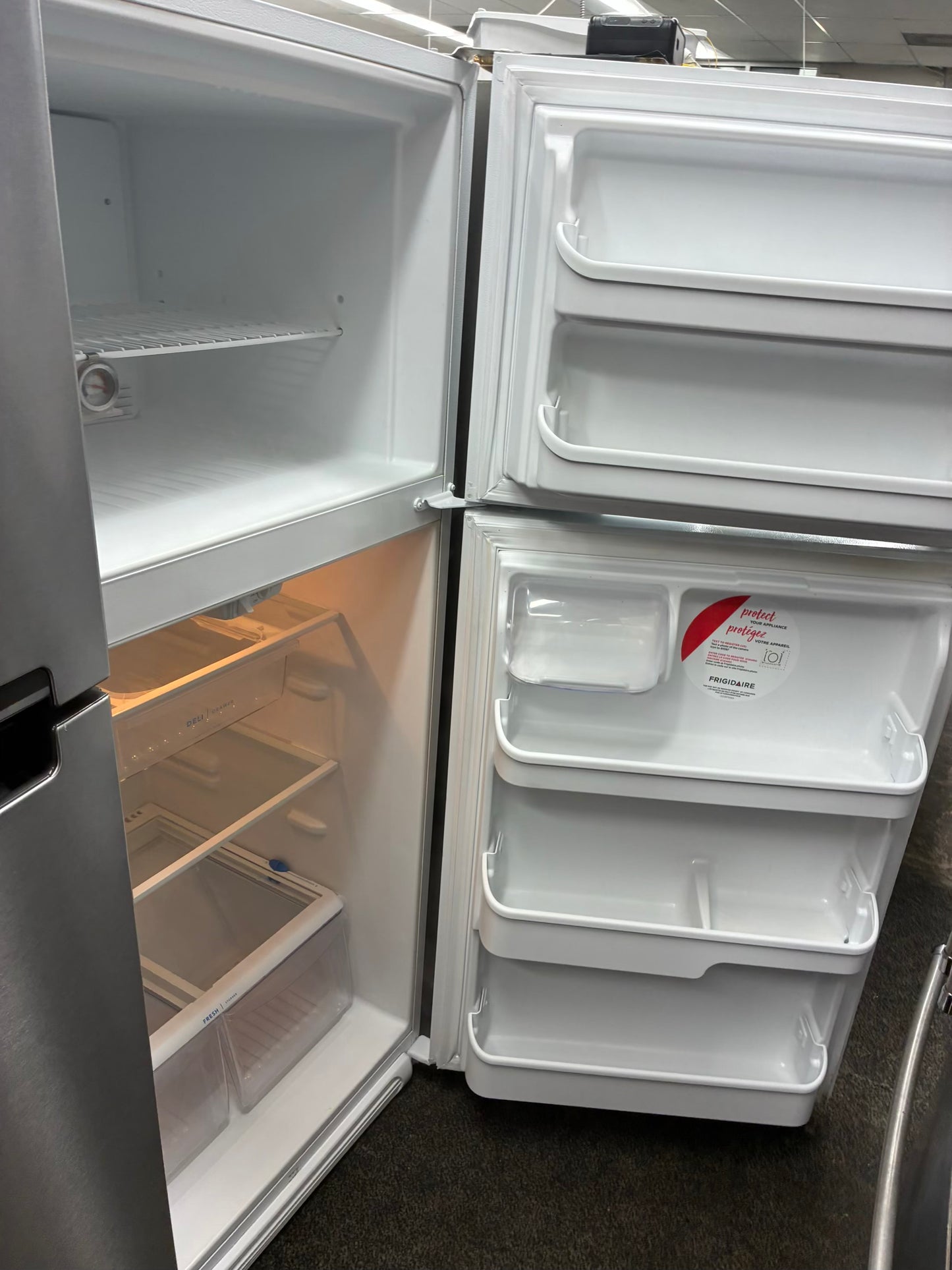 Frigidaire top freezer refrigerator black 30”