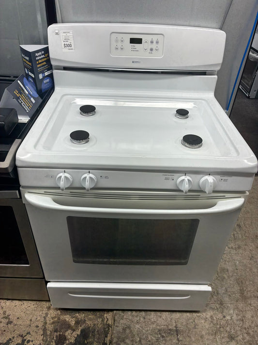 Kenmore gas range , 4 burner cream color 30”