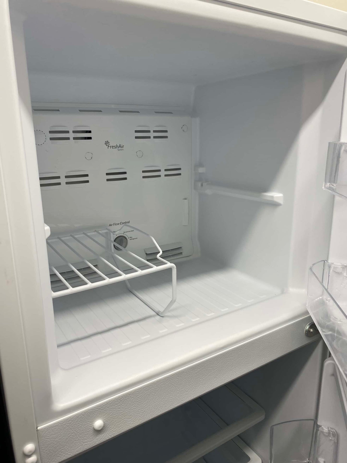 - ITEM: #RF96C Whirlpool top freezer white refrigerator  24 inc