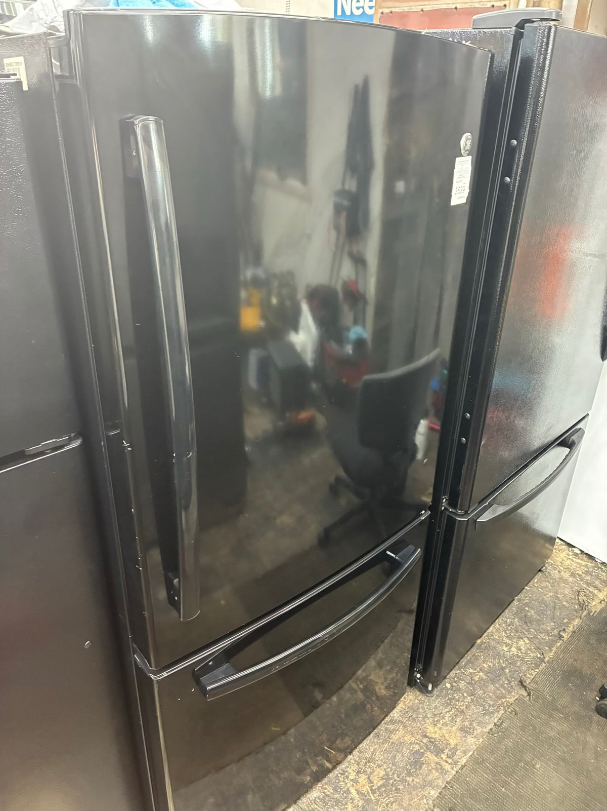 GE bottom freezer refrigerator  33” black