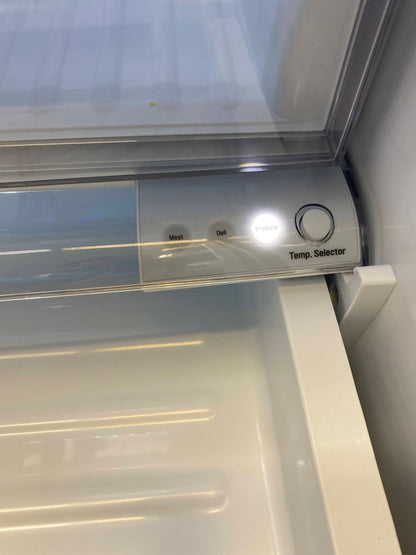LG French door refrigerator showcase stainless steel w/water ice dispenser 33”