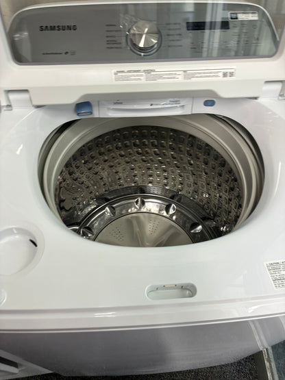 SAMSUMG electric washer and dryer 27” top load