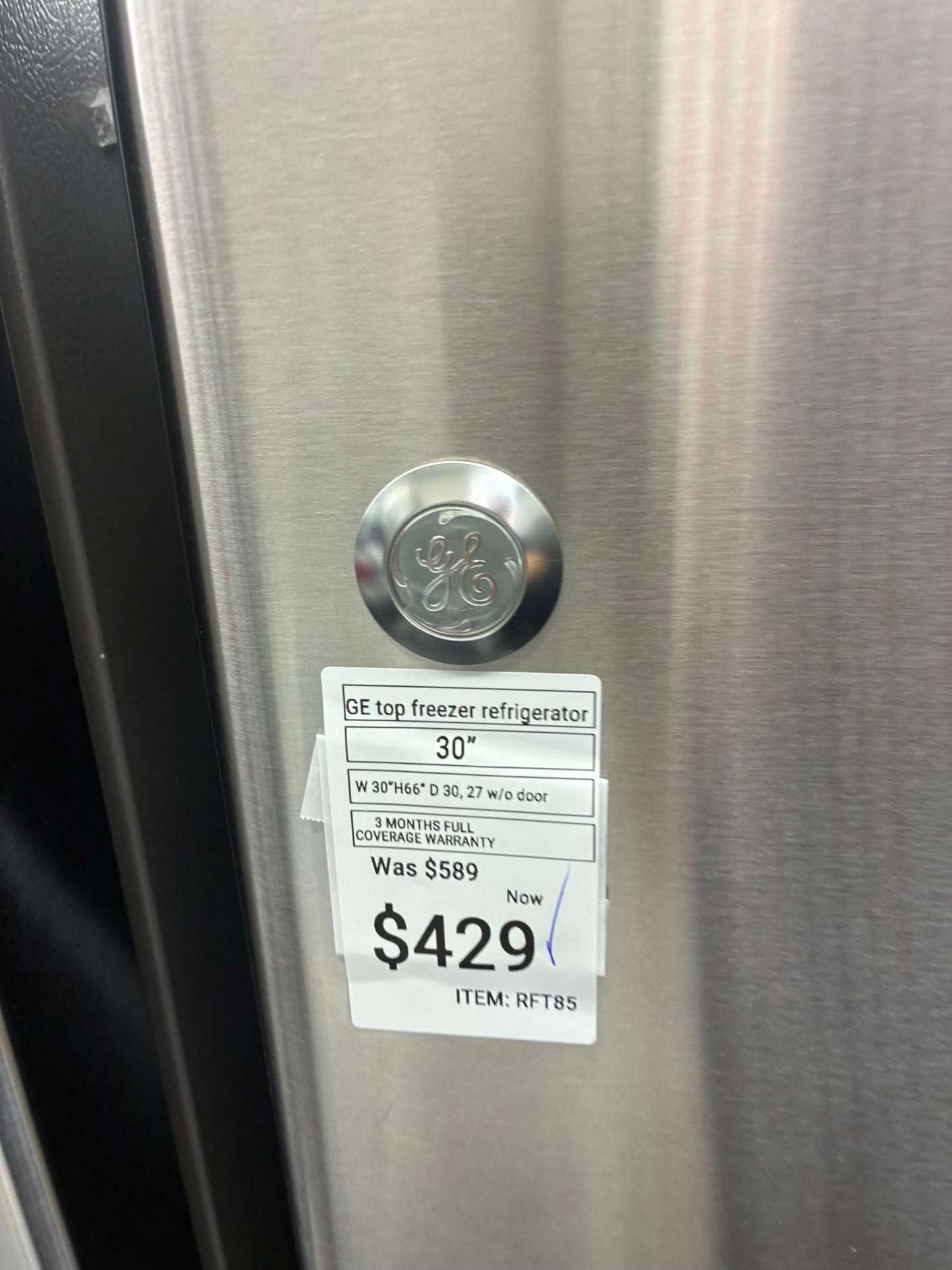 GE top freezer refrigerator stainless steel 30”