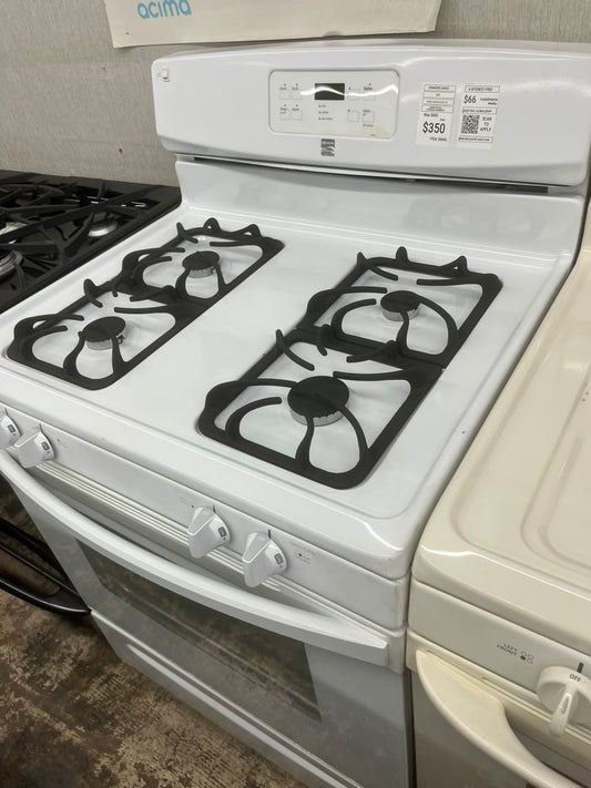 ^ ITEM #ER49D Kenmore gas range white 4 burner 24” in