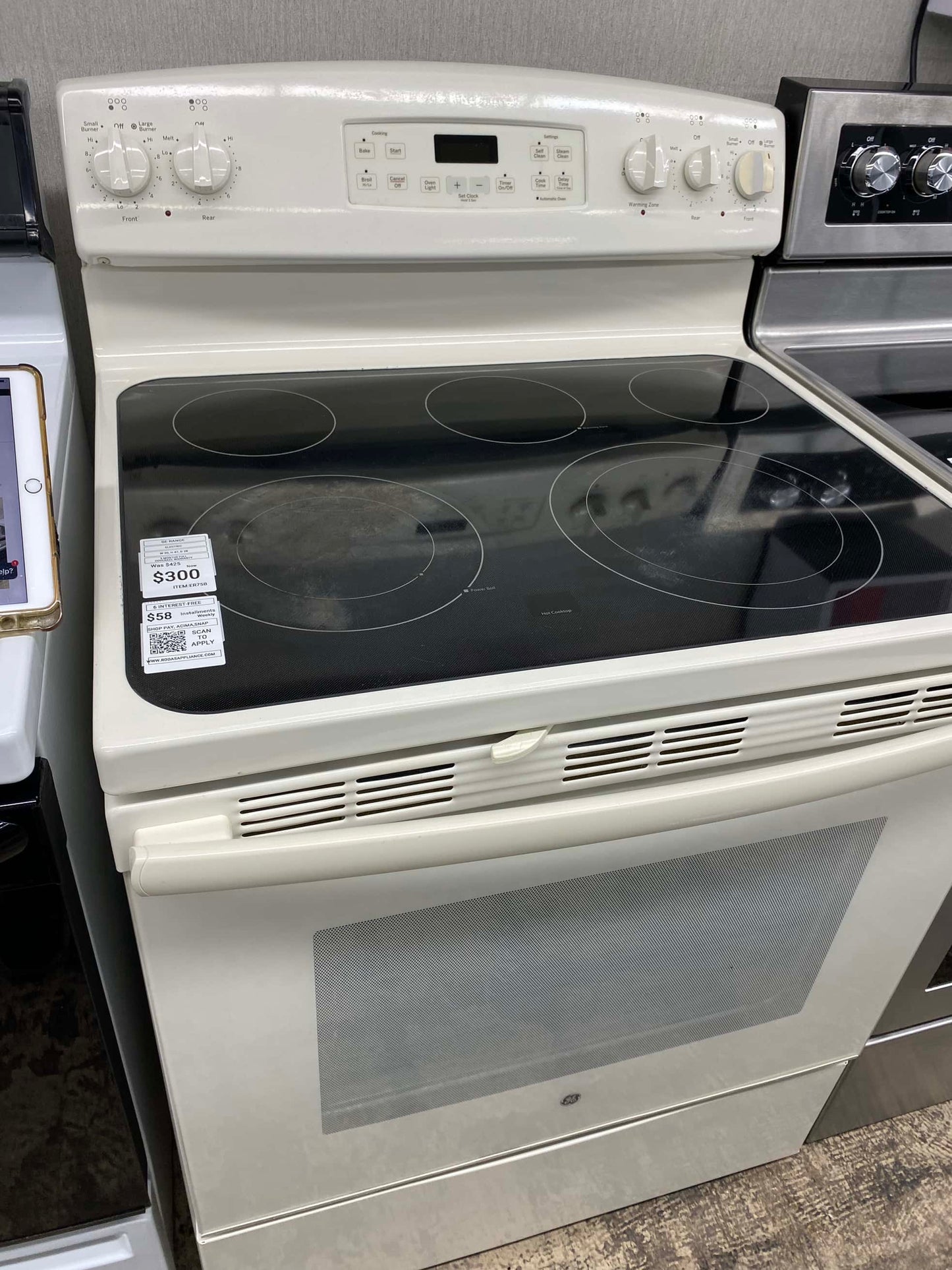 Item: #ER75B GE electric 220v range 4 burner  white 30 in