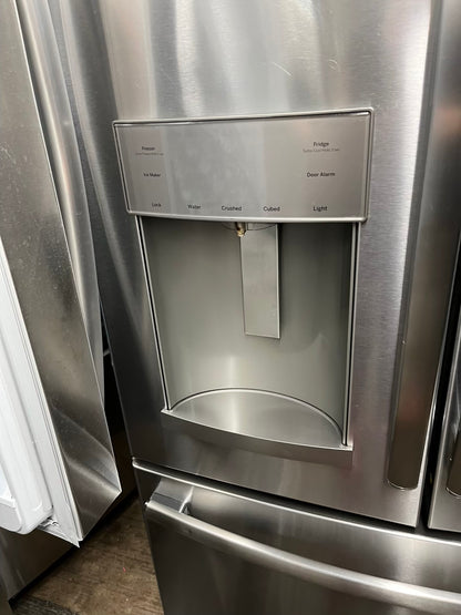 ^ #RF47W GE french door refrigerator slate stainless steel w/ ice and water dispenser inside 33” in