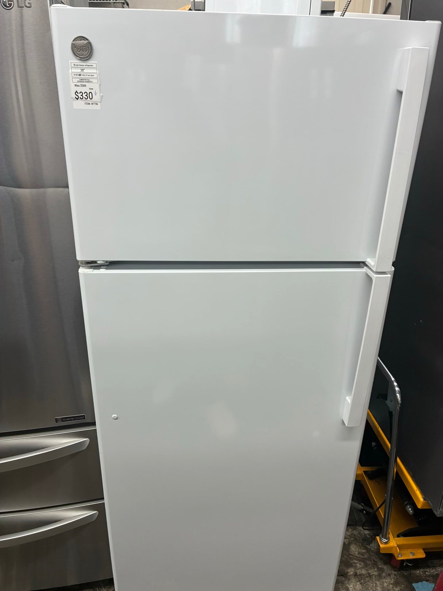 GE top freezer refrigerator white 28”