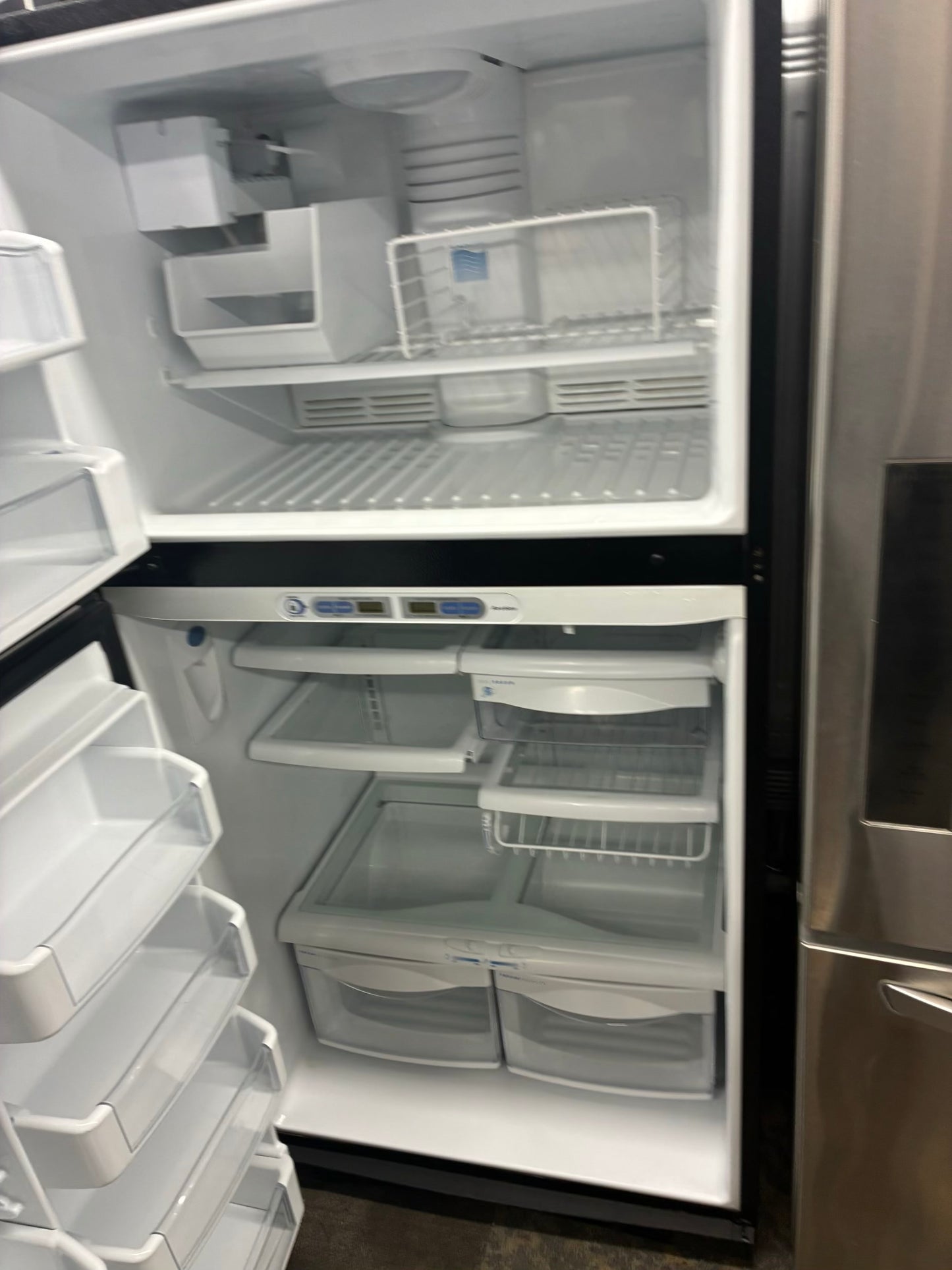 GE top freezer refrigerator stainless steel 33”