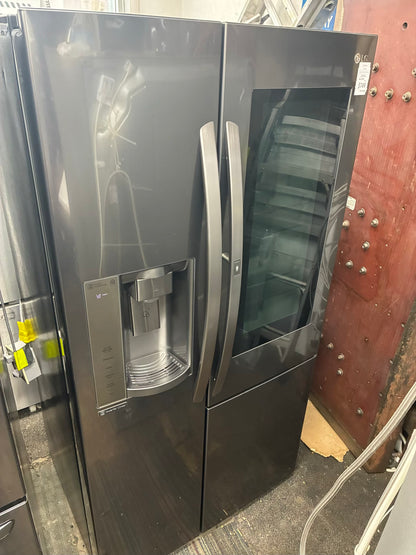 LG. Side by side smart refrigerator  with craft ice  maker water dispenser 36” in