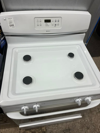 Kenmore gas range , 4 burner cream color 30”