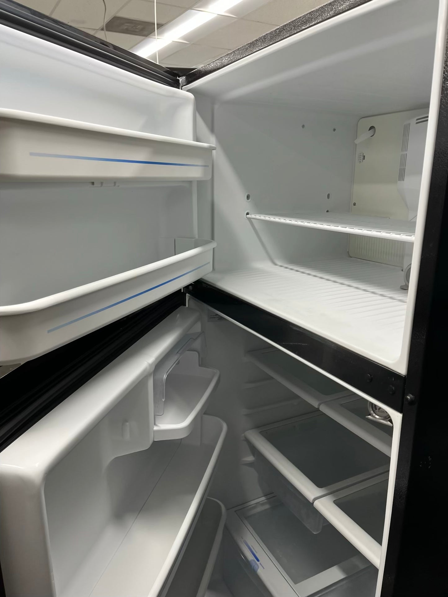 ITEM: #RF94D GE top freezer stainless steel  refrigerator  33” in