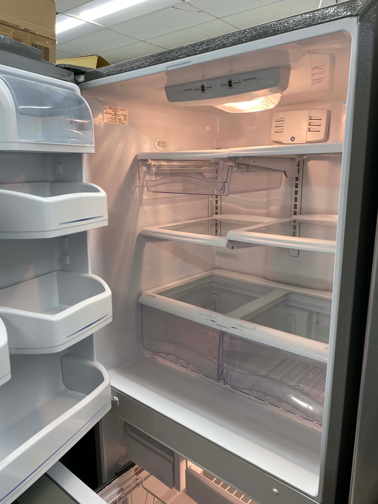 ITEM: #RF58H  GE bottom  freezer refrigerator slate stainless steel 33”