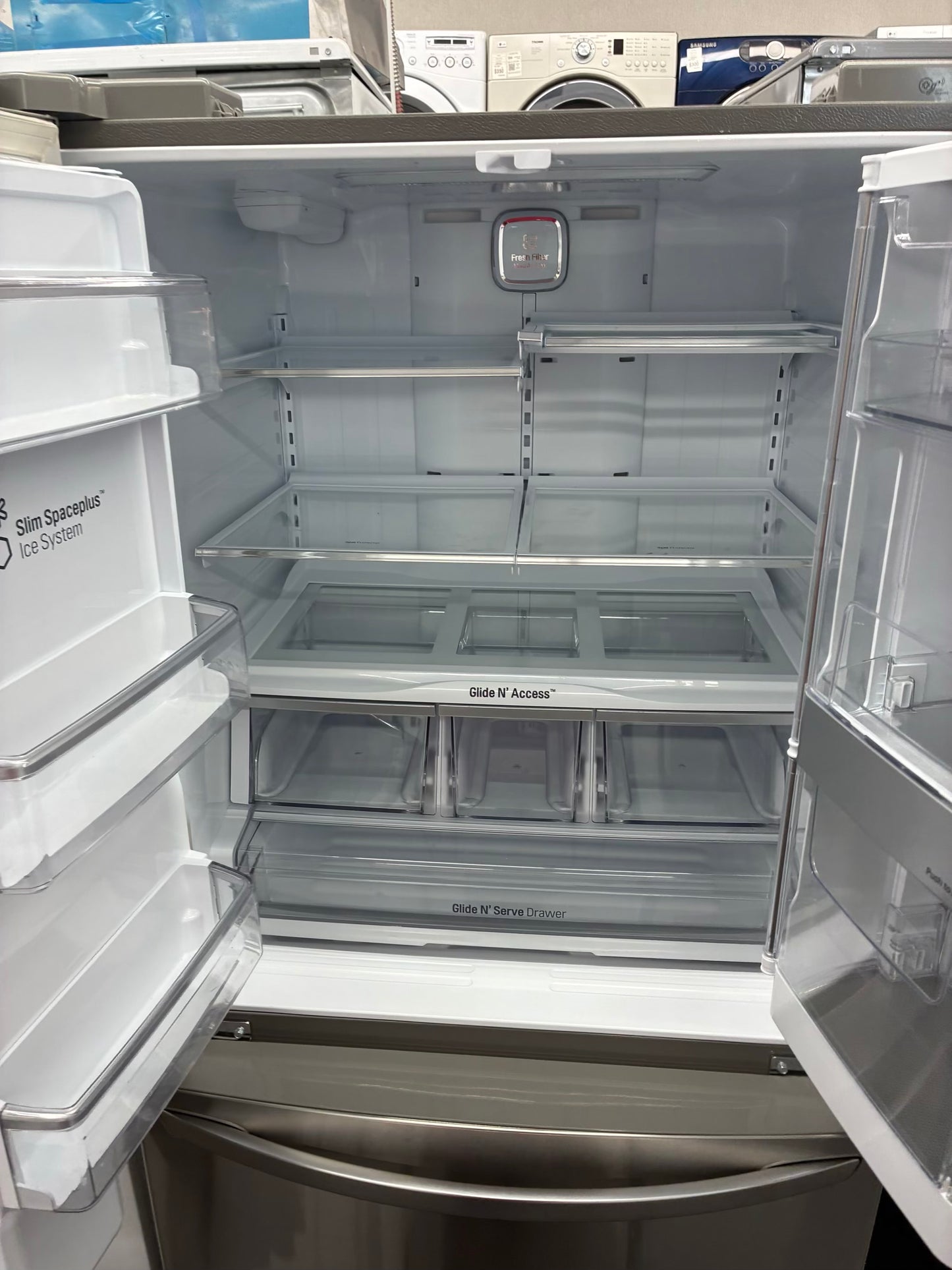 LG French door refrigerator stainless steel 36” ice maker water dispenser show case