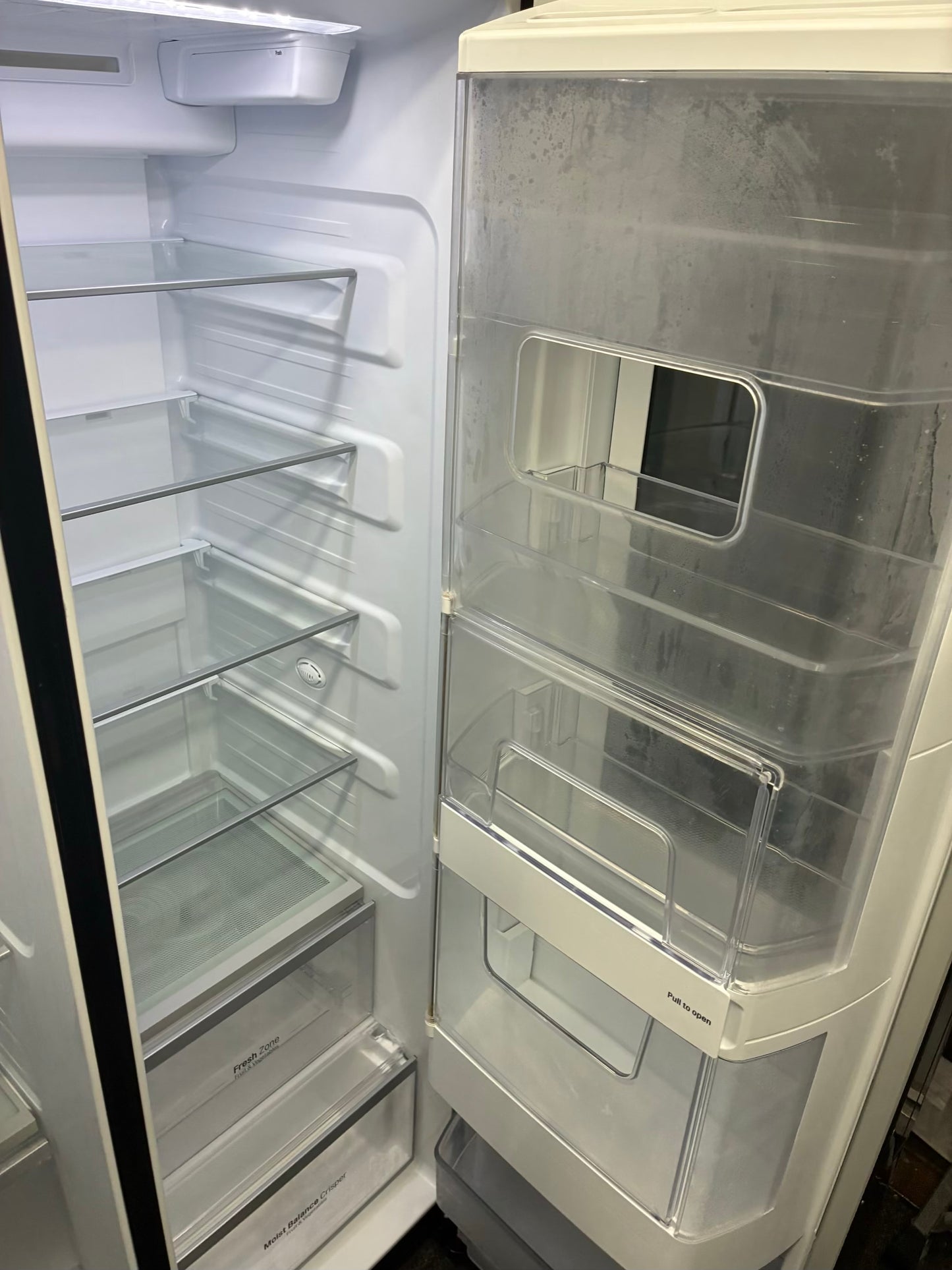 LG. Side by side smart refrigerator  with craft ice  maker water dispenser 36” in