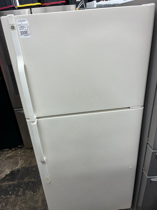 GE top freezer refrigerator  30” beige