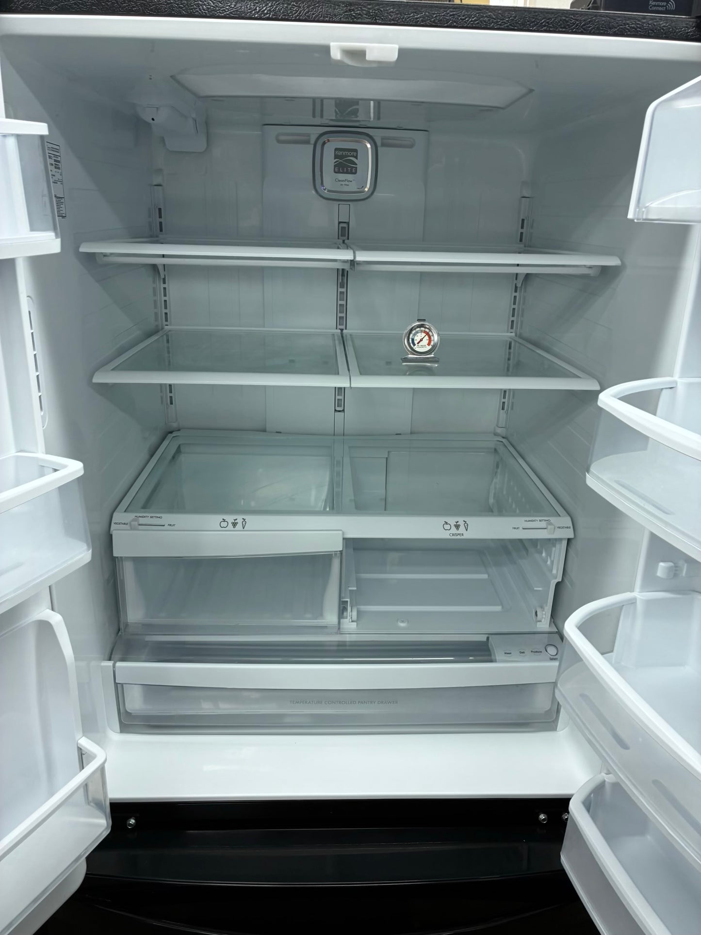 Kenmore French door refrigerator black 33” ice maker water dispenser