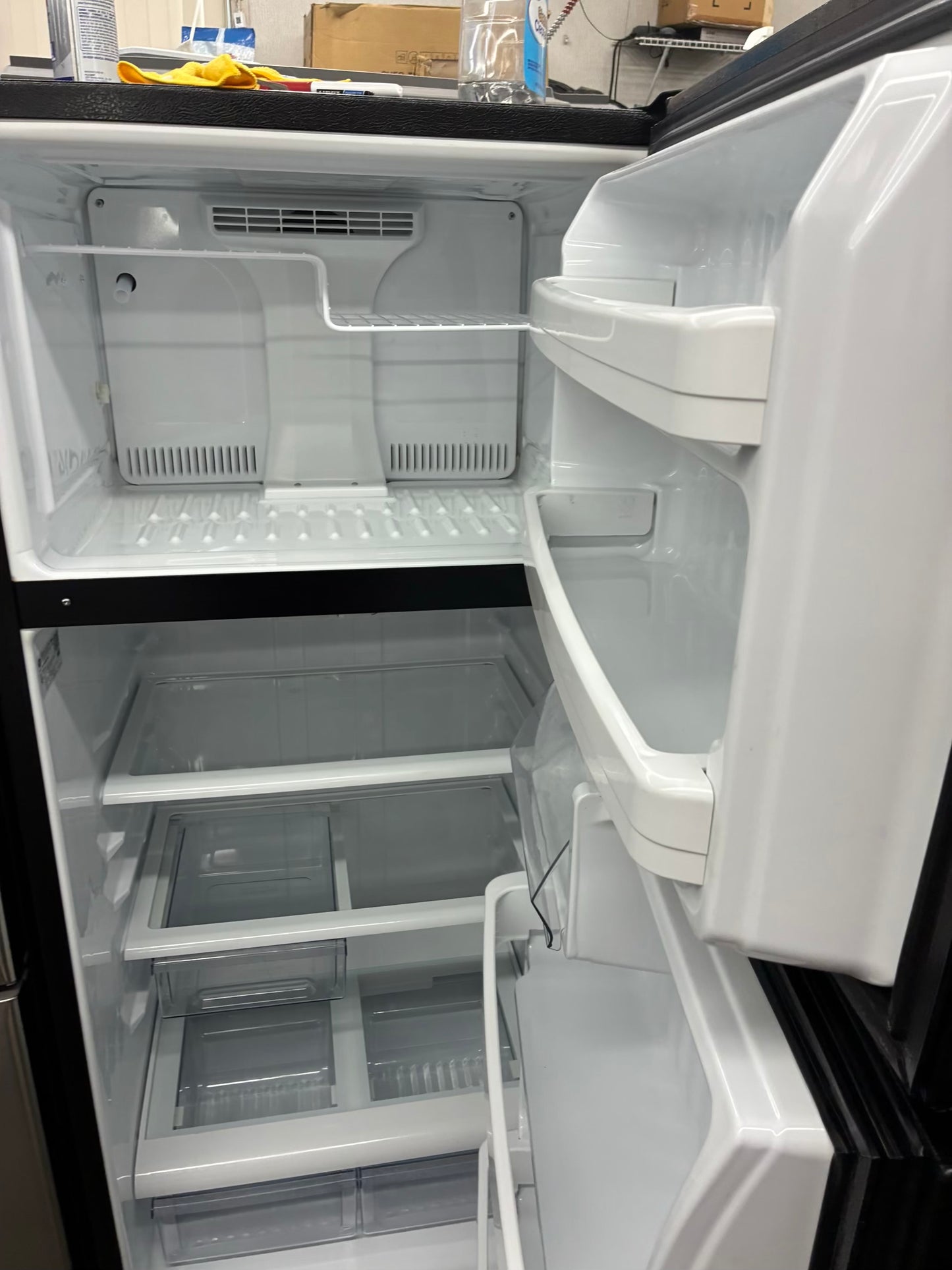 GE top freezer refrigerator black 28”