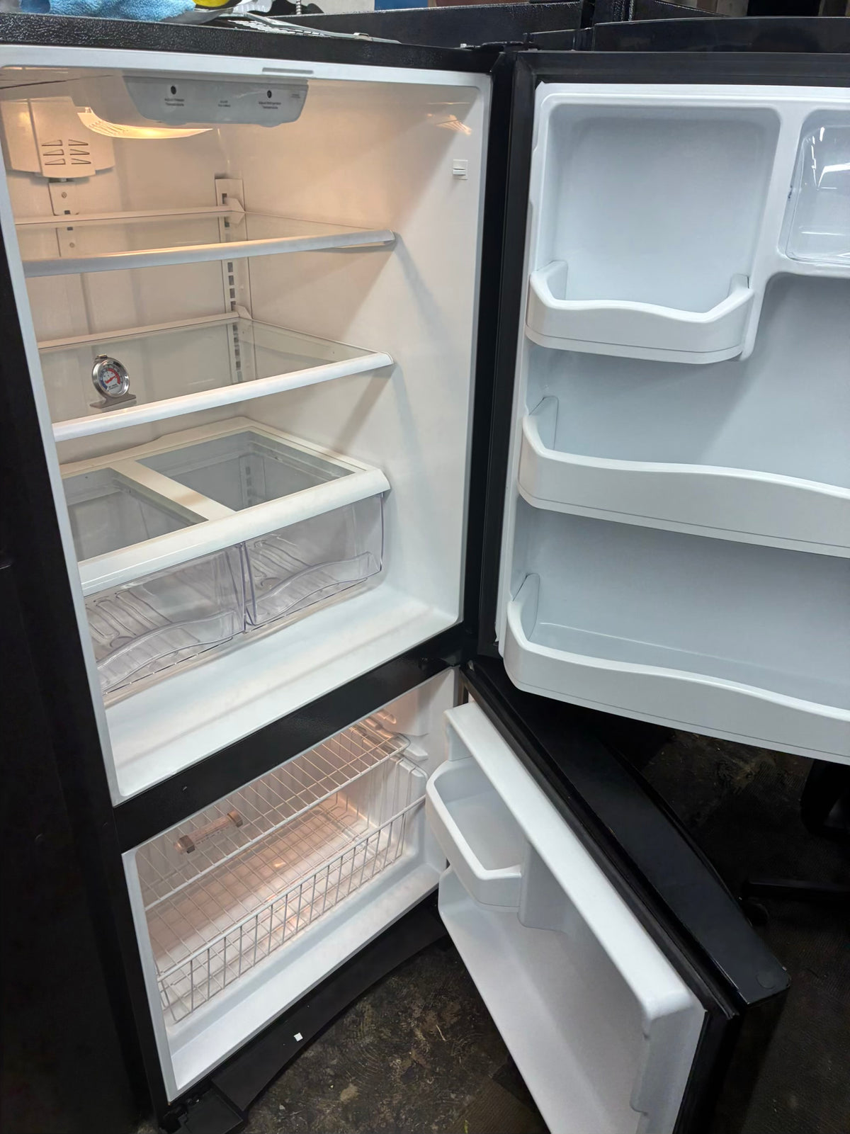 GE bottom freezer refrigerator  33” black