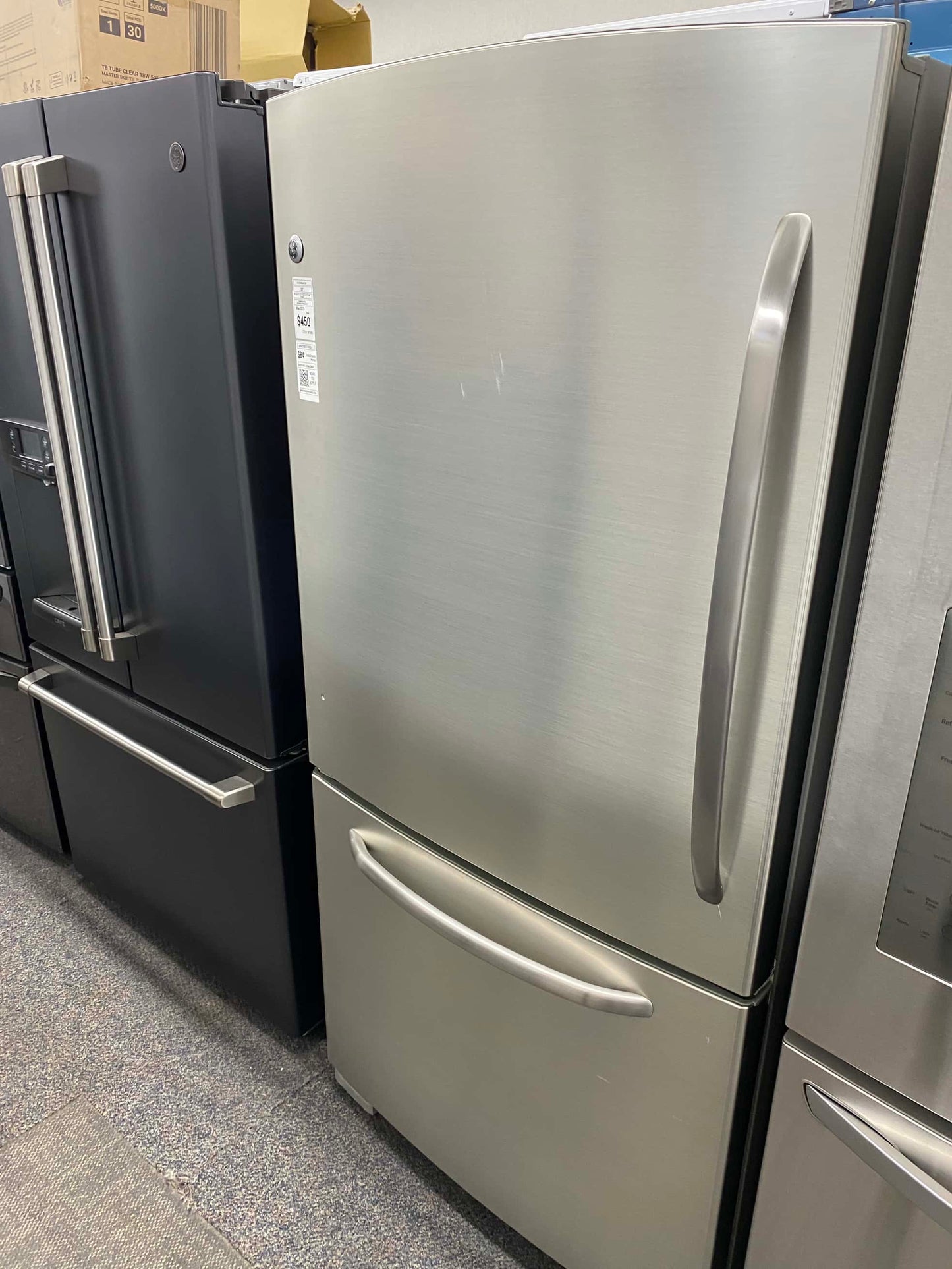 ITEM: #RF58H  GE bottom  freezer refrigerator slate stainless steel 33”