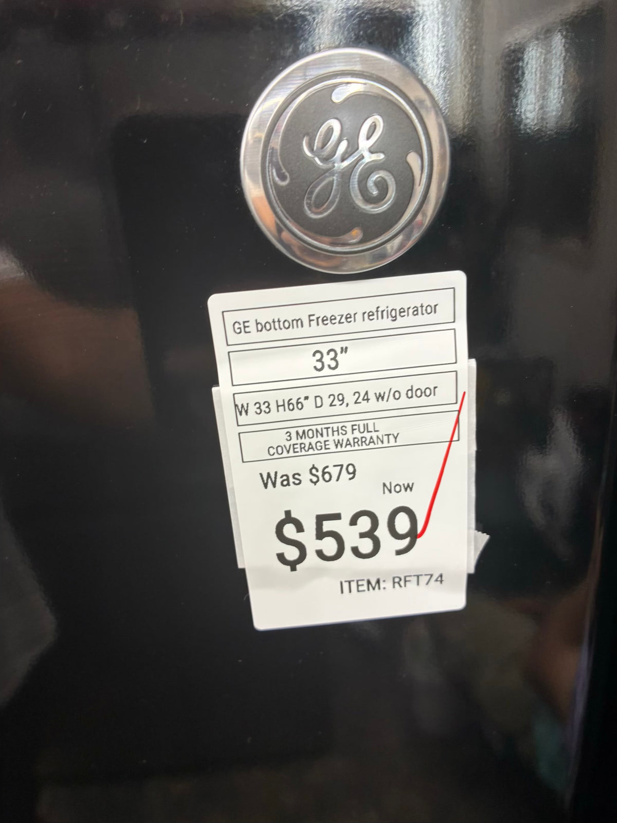 GE bottom freezer refrigerator  33” black