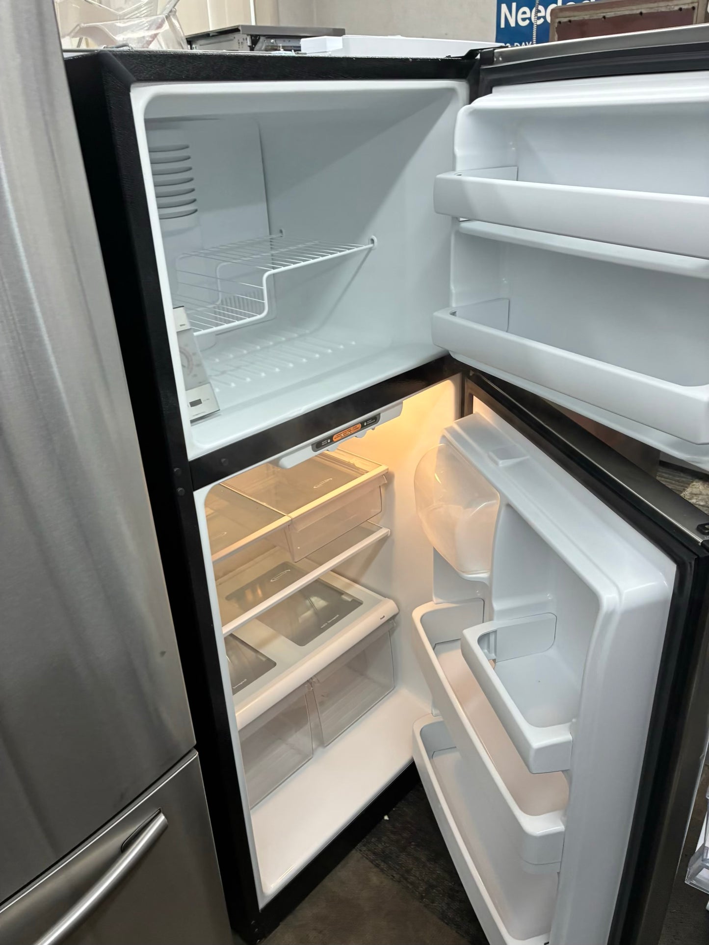 GE top freezer refrigerator stainless steel 30”
